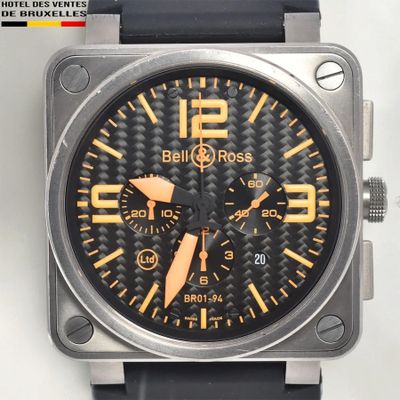 bell & ross watch with black rubber strap and gold accents