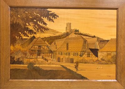 a picture of a painting of a village with a castle in the background