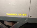 a sign that says tunnel ir 80 on the side of a train