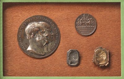 a picture of a picture of a coin and some coins