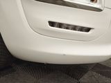 a close up view of a car ' s front bumper
