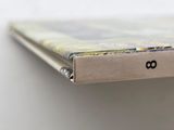 a picture of a close up of a book on a table