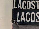 a close up of a pair of laccoste lacrosse socks