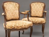 une paire de fauteuils de style Louis II