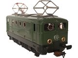 a green train that is on the tracks on a white background