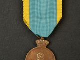 a close up of a medal on a black surface