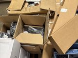 a pile of boxes and other items on the floor