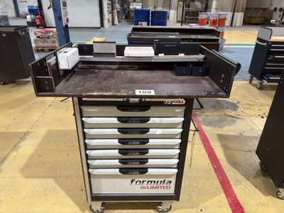 an image of a table with a lot of drawers on top of it