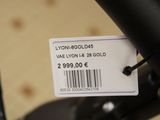 a close up of a bicycle with a price tag attached to it