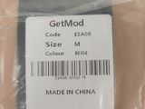 a label on a piece of plastic that says getmod