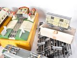 a lot of toy trains that are sitting on a table