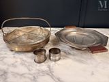 silverware on a marble counter top with a wooden handle