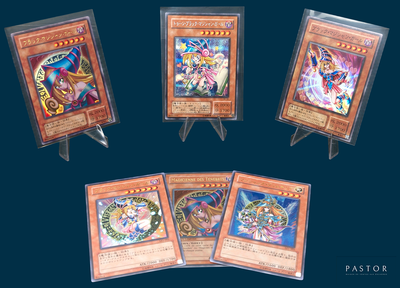 four cards of different types are displayed on a stand