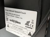 a close up of a sign on a shelf in a room