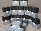 several boxes are stacked on top of each other on a table