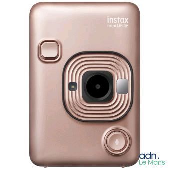 an instax mini camera with a pink cover