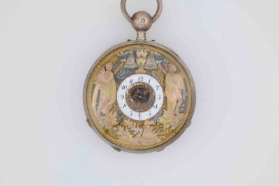 a gold pocket watch with a clock on it