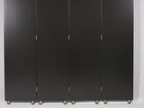 a room divider in the middle of a room with four partitions