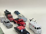 a lot of toy cars that are sitting on a table