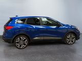 the rear end of a blue 2020 nissan c - hr