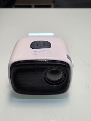 a small projector sitting on a white table