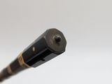 a pen that is sitting on top of a table