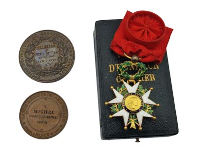 a book with a medal and a medal on it