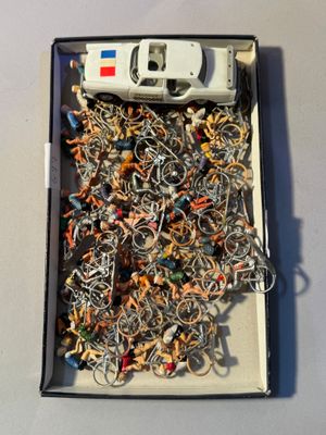 a box full of assorted metal items on a table