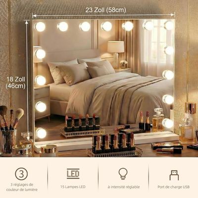 a bedroom with a bed and a mirror with lights on it