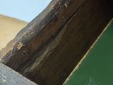 a close up of a piece of wood that has been damaged
