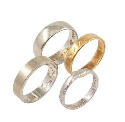 three different types of wedding rings on a white background
