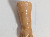 a toy hand that is sitting on a table