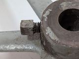 a close up of a metal object on a white surface