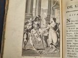 an open book with a picture of a man and a woman on it