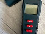 a remote control that is sitting on a table