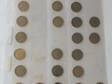 a lot of coins that are in a plastic bag