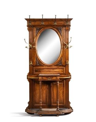 a wooden cabinet with a mirror on top of it