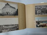 an open book with a bunch of old photos on it