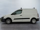 a white van that is parked in a parking lot