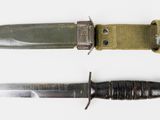 two different types of knives on a white surface