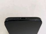the back of a black iphone with the camera facing towards the camera