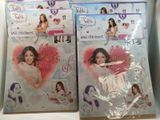 two bags of stickers with pictures of the girls on them