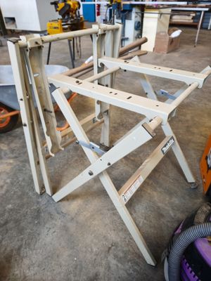 several pieces of wood sit on top of a table in a workshop