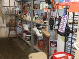 a room with a lot of items on the shelves