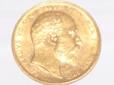 an image of a gold coin with a man ' s head