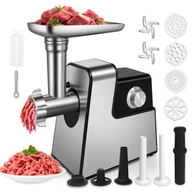a close up of a meat grinder with meat in it