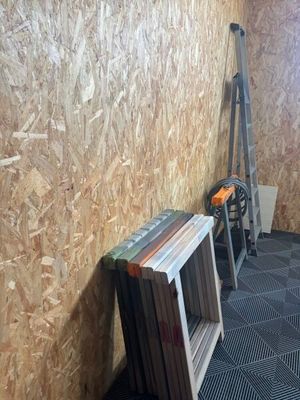 a picture of a room that is being remodeled with plywood flooring
