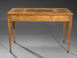 an old wooden table with a wooden top on a gray surface