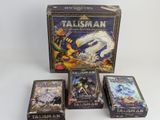 three boxes of talismann cards and a box of talismann cards