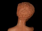 an image of a clay head of a man